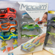 The deluxe three pack contains three cars with two additional hoods and fenders and retails around $59.99.